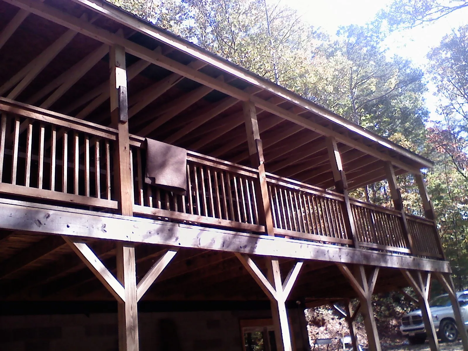 Timber framing under a new elevated porch and deck — Roof Leak Repair in Loraine by Roofing Brothers